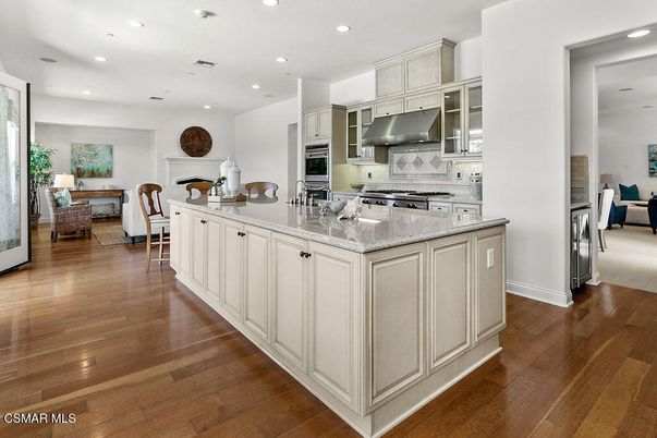 Dining room, Interior, Kitchen, Recessed Lighting, Stainless Steel Appliances, Wood Texture Flooring