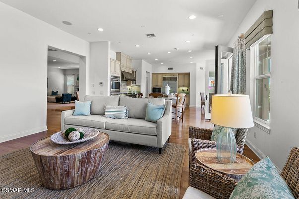 Dining room, Interior, Kitchen, Living room, Recessed Lighting, Stainless Steel Appliances, Wood Texture Flooring