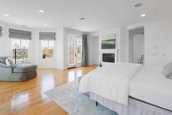 Bedroom, Fireplace, Interior, Recessed Lighting, Wood Texture Flooring