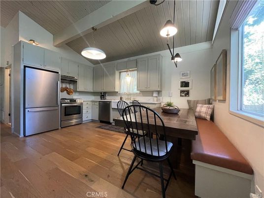 Dining room, Interior, Kitchen, Pendant Lights, Stainless Steel Appliances, Wood Texture Flooring