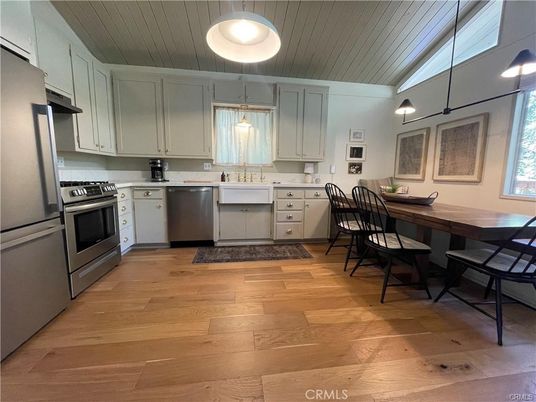 Dining room, Interior, Kitchen, Pendant Lights, Stainless Steel Appliances, Wood Texture Flooring