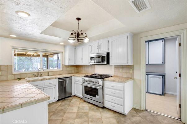 Interior, Kitchen, Pendant Lights, Recessed Lighting, Stainless Steel Appliances, Tile Countertops