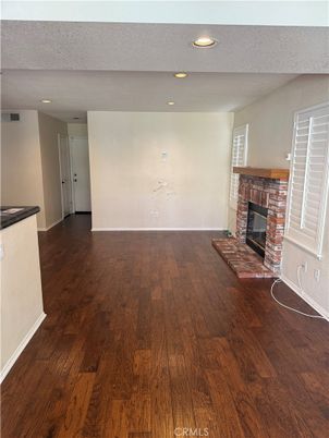 Empty room, Fireplace, Interior, Recessed Lighting, Wood Texture Flooring