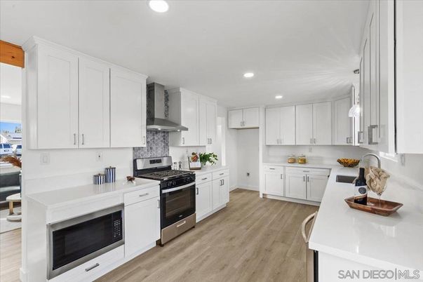 Interior, Kitchen, Pendant Lights, Recessed Lighting, Stainless Steel Appliances, Water, Wood Texture Flooring