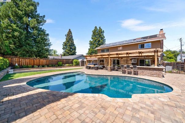 Exterior, Pool, Solar Panels
