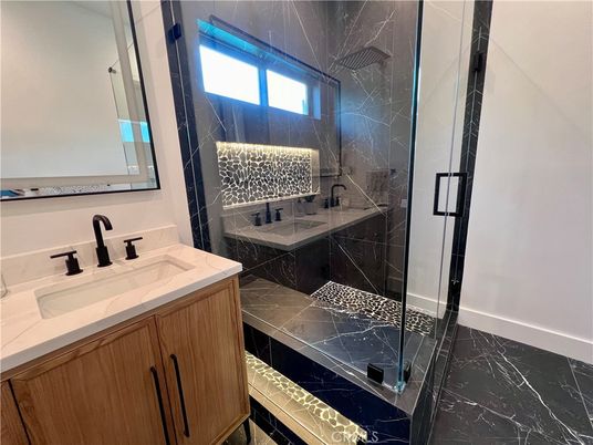 Bathroom, Dual Sink Vanities, Glass Shower, Interior, Marble, Marble Walls