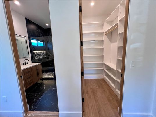 Bathroom, Interior, Marble, Marble Walls, Recessed Lighting, Walk-in Closets, Wood Texture Flooring