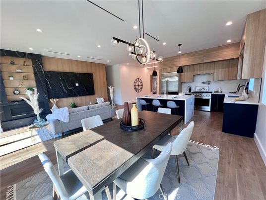 Dining room, Interior, Kitchen, Living room, Pendant Lights, Recessed Lighting, Stainless Steel Appliances, Wood Texture Flooring