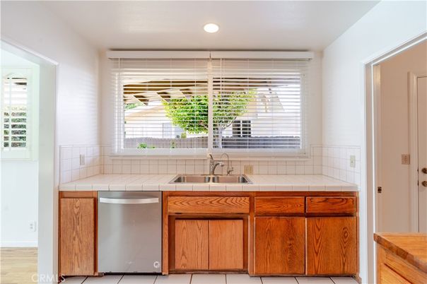 Interior, Kitchen, Recessed Lighting, Stainless Steel Appliances, Tile Countertops