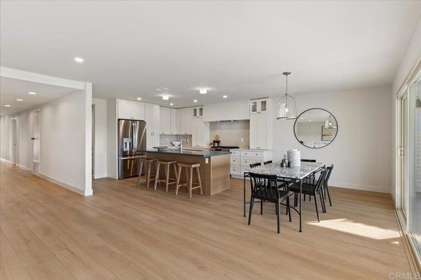 Dining room, Interior, Kitchen, Pendant Lights, Recessed Lighting, Stainless Steel Appliances, Wood Texture Flooring