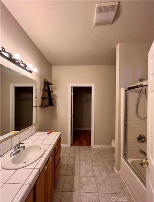 Bathroom, Dual Sink Vanities, Interior, Marble, Tile Countertops, Wood Texture Flooring