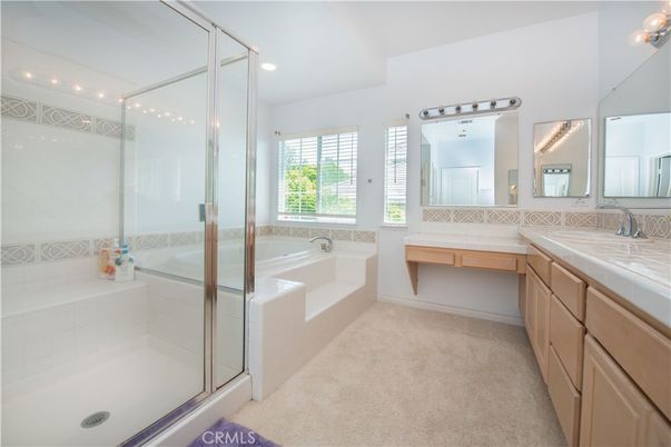 Bathroom, Dual Sink Vanities, Glass Shower, Interior, Recessed Lighting, Tile Countertops