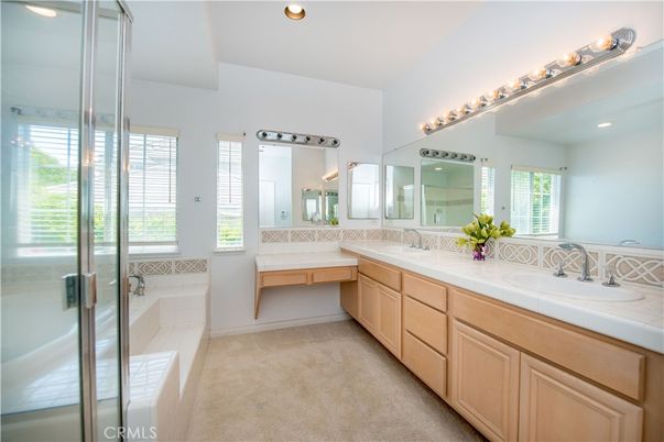 Bathroom, Dual Sink Vanities, Glass Shower, Interior, Recessed Lighting, Tile Countertops