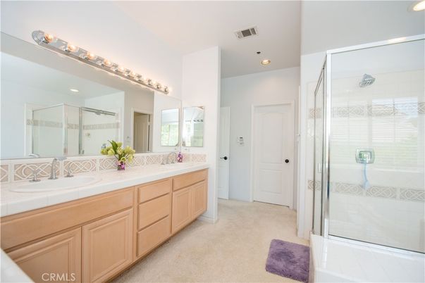 Bathroom, Dual Sink Vanities, Glass Shower, Interior, Recessed Lighting, Tile Countertops