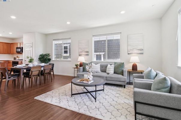 Dining room, Interior, Kitchen, Living room, Recessed Lighting, Stainless Steel Appliances, Wood Texture Flooring