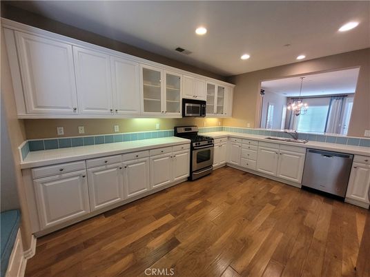 Chandelier, Interior, Kitchen, Recessed Lighting, Stainless Steel Appliances, Wood Texture Flooring