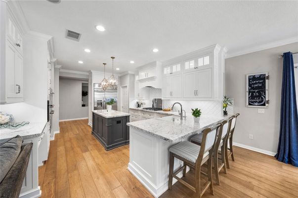 Chandelier, Interior, Kitchen, Pendant Lights, Recessed Lighting, Stainless Steel Appliances, Wood Texture Flooring