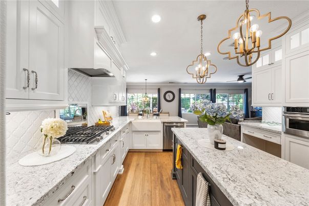 Chandelier, Interior, Kitchen, Pendant Lights, Recessed Lighting, Stainless Steel Appliances, Wood Texture Flooring
