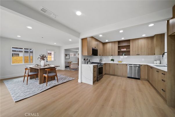 Dining room, Interior, Kitchen, Recessed Lighting, Stainless Steel Appliances, Wood Texture Flooring