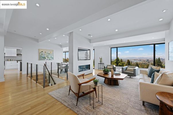 Dining room, Fireplace, Interior, Living room, Recessed Lighting, Wood Texture Flooring