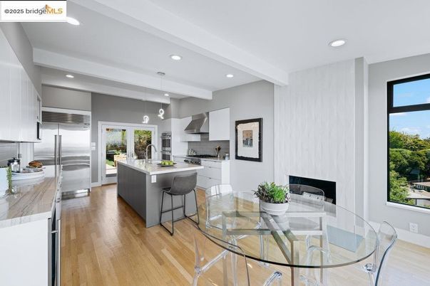 Dining room, Interior, Kitchen, Pendant Lights, Recessed Lighting, Stainless Steel Appliances, Wood Texture Flooring