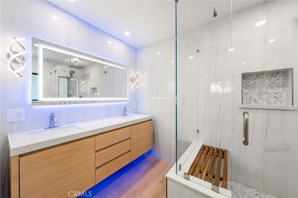 Bathroom, Dual Sink Vanities, Glass Shower, Interior, Recessed Lighting, Wood Texture Flooring