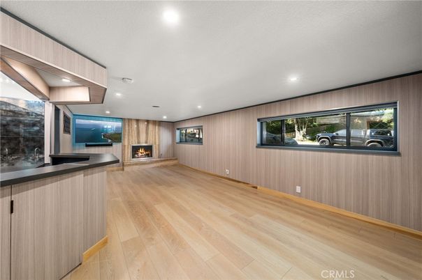 Fireplace, Interior, Recessed Lighting, Wood Texture Flooring, Wooden Walls