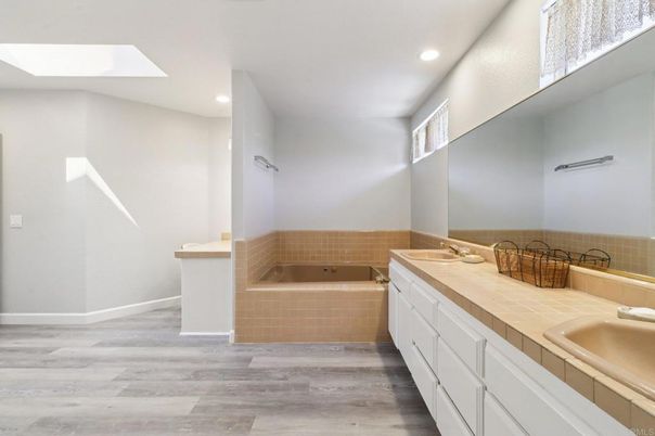 Bathroom, Dual Sink Vanities, Interior, Recessed Lighting, Tile Countertops, Wood Texture Flooring