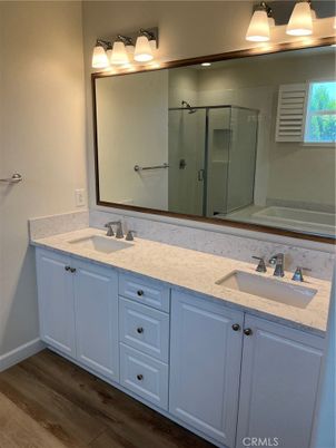 Bathroom, Dual Sink Vanities, Glass Shower, Interior, Wood Texture Flooring
