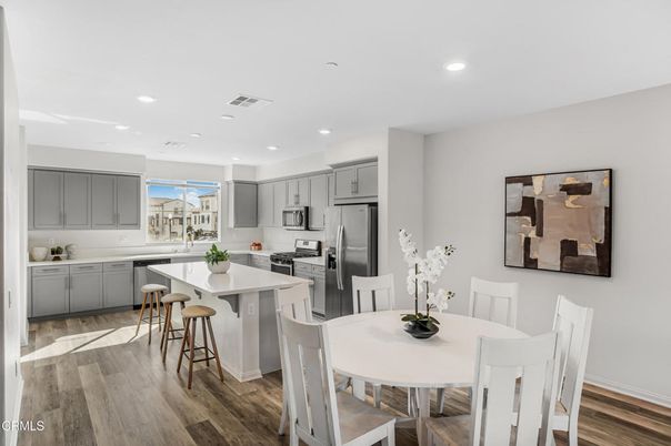 Dining room, Interior, Kitchen, Recessed Lighting, Stainless Steel Appliances, Wood Texture Flooring