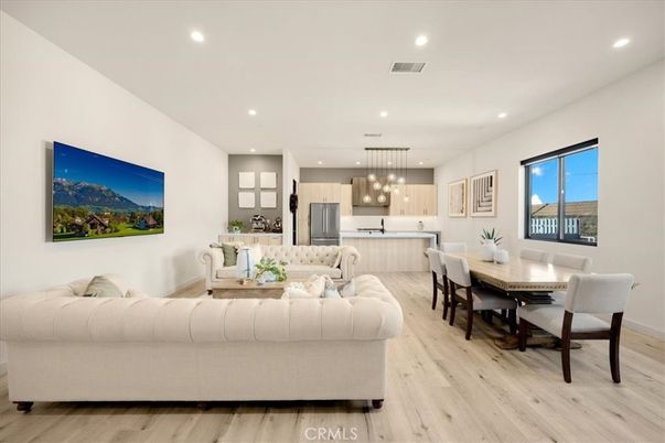 Dining room, Interior, Kitchen, Living room, Pendant Lights, Recessed Lighting, Stainless Steel Appliances, Wood Texture Flooring