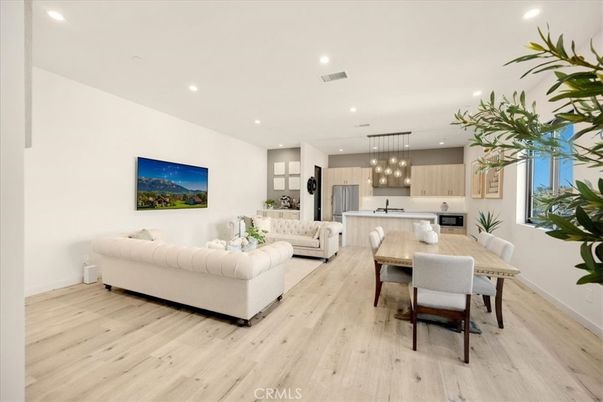 Dining room, Interior, Kitchen, Living room, Pendant Lights, Recessed Lighting, Stainless Steel Appliances, Wood Texture Flooring