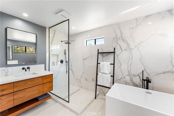 Bathroom, Dual Sink Vanities, Free Standing Baths, Glass Shower, Interior, Marble Walls, Recessed Lighting