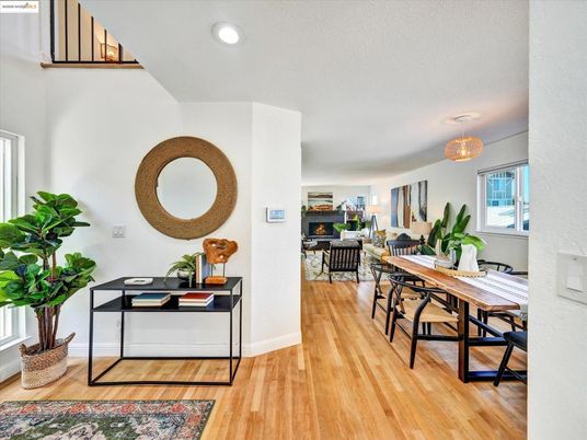 Dining room, Fireplace, Interior, Living room, Recessed Lighting, Wood Texture Flooring