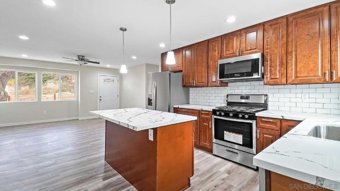 Interior, Kitchen, Pendant Lights, Recessed Lighting, Stainless Steel Appliances, Wood Texture Flooring