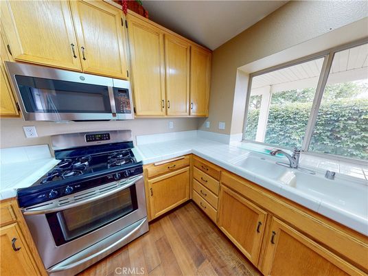 Interior, Kitchen, Tile Countertops, Wood Texture Flooring