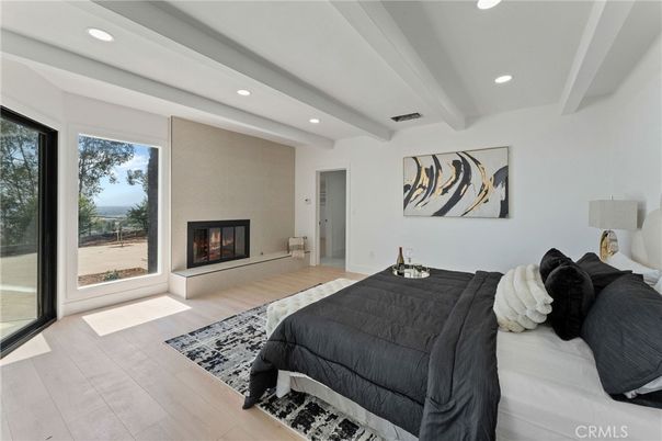 Bedroom, Fireplace, Interior, Recessed Lighting, Wood Texture Flooring