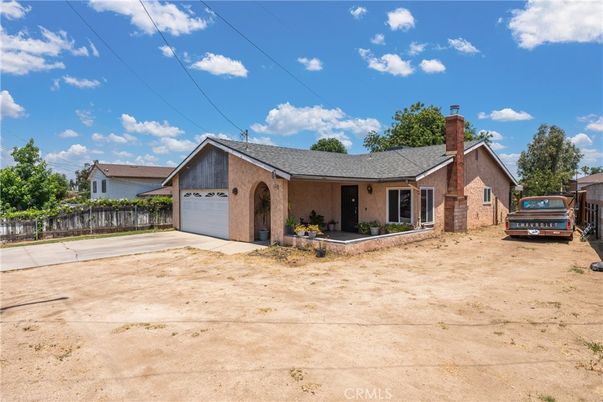 Attached, Backyard, Exterior, Facade, Brick Facade, Ranch