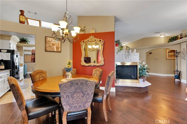 Chandelier, Dining room, Fireplace, Interior, Kitchen, Wood Texture Flooring