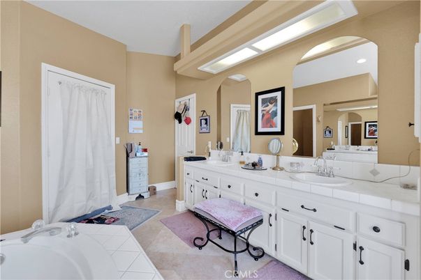 Bathroom, Dual Sink Vanities, Interior, Recessed Lighting, Tile Countertops