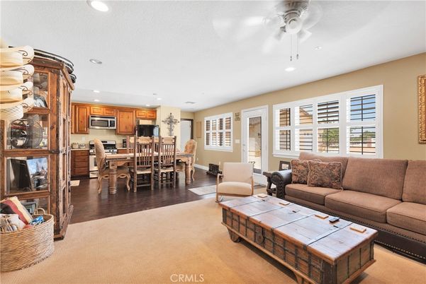 Dining room, Interior, Kitchen, Living room, Recessed Lighting, Stainless Steel Appliances, Wood Texture Flooring