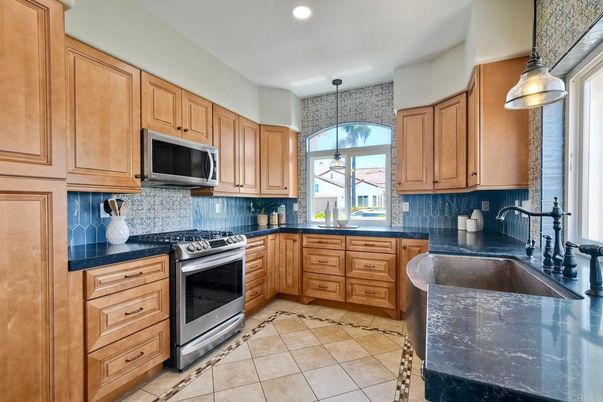 Interior, Kitchen, Pendant Lights, Recessed Lighting, Stainless Steel Appliances, Stone Walls