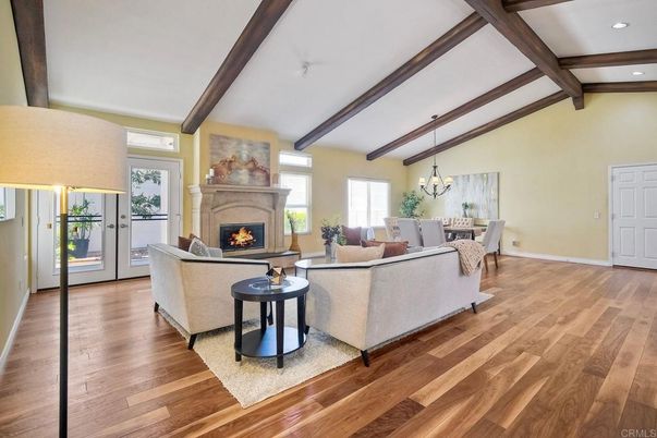 Chandelier, Dining room, Fireplace, Interior, Living room, Pendant Lights, Recessed Lighting, Wooden Beams, Wood Texture Flooring