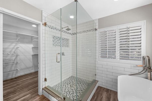 Bathroom, Glass Shower, Interior, Recessed Lighting, Walk-in Closets, Wood Texture Flooring
