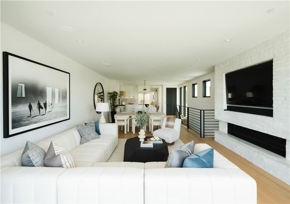Dining room, Fireplace, Interior, Living room, Pendant Lights, Recessed Lighting, Wood Texture Flooring