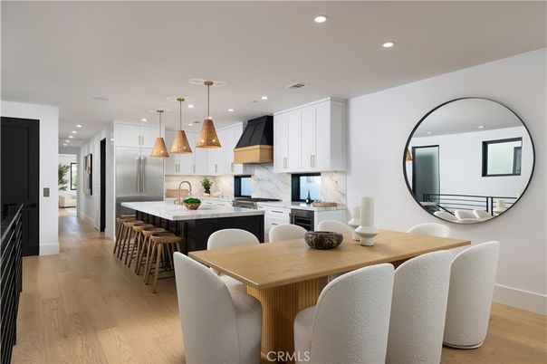 Dining room, Interior, Kitchen, Pendant Lights, Recessed Lighting, Stainless Steel Appliances, Wood Texture Flooring