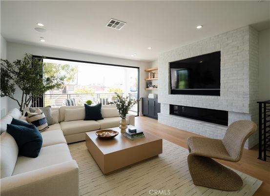 Fireplace, Interior, Living room, Recessed Lighting, Stone Walls, Wood Texture Flooring