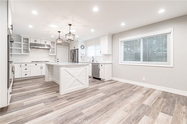 Interior, Kitchen, Pendant Lights, Recessed Lighting, Stainless Steel Appliances, Wood Texture Flooring