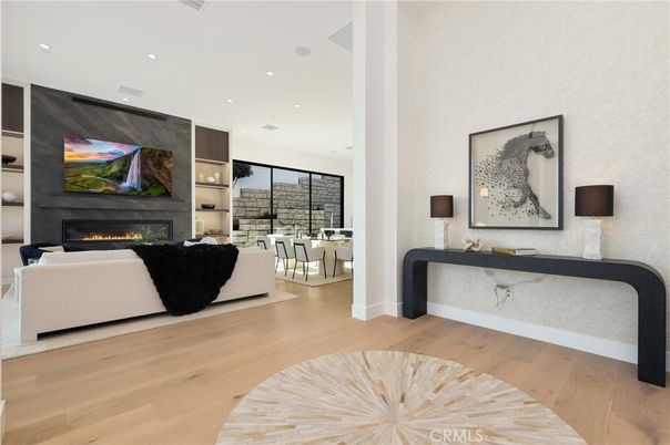 Dining room, Fireplace, Interior, Living room, Recessed Lighting, Wood Texture Flooring