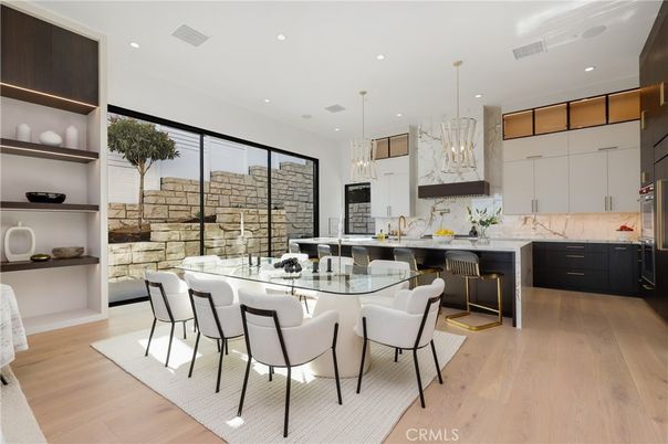 Interior, Kitchen, Marble Walls, Pendant Lights, Recessed Lighting, Stainless Steel Appliances, Wood Texture Flooring